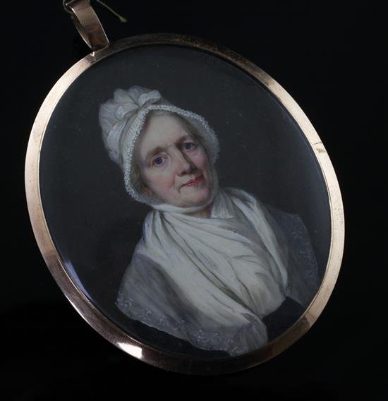 A 19th century oval miniature watercolour of an elderly lady, in a gold and enamel frame, 3.5in inc. bale.